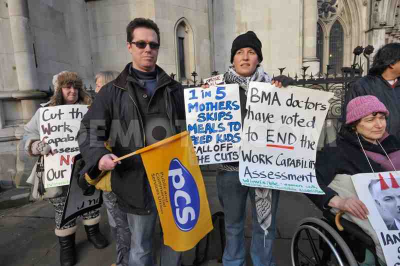 Protesters and PCS representatives in solidarity with Mental Health Resistance Network & DPAC vigil outside court during judicial review of unfair DWP-Atos so-called Work Capability Assessments 17th January 2013
