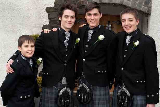 Craig, second left, with Fraser, second right, and stepbrothers Andrew, left, and James, right
