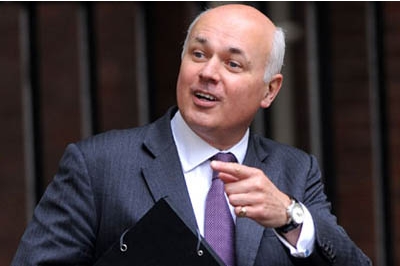 Work and Pensions Secretary Iain Duncan Smith has been branded a "ratbag" by a furious protester who disrupted the UK Government minister as he defended controversial welfare reforms.